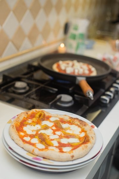 Pizza individual — por unidad